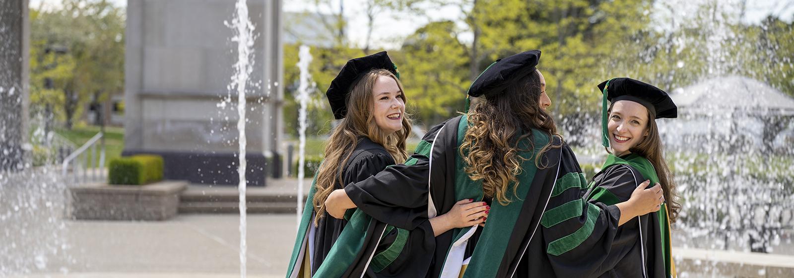 An image of OUWB students celebrating graduation